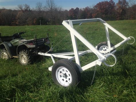 Trailer 3060 R, 2 wheels, tilting, all-terrain, with rear panel, 30 "X 60", rocking, next to 14 ". . Atv round bale unroller